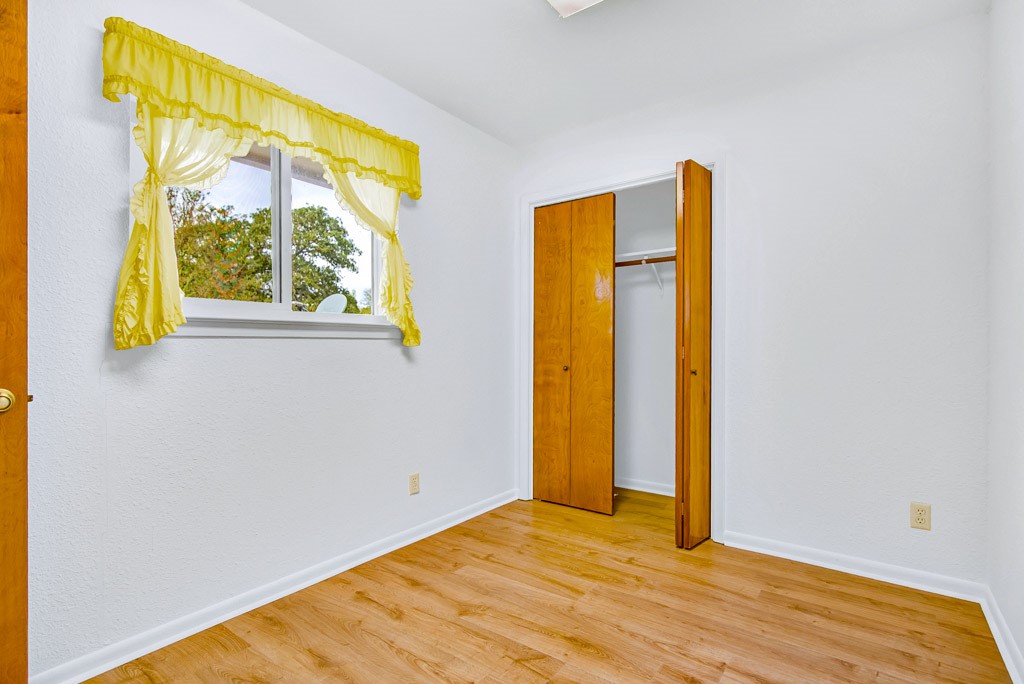 298 Jenkins Road Cedar Creek, TX 78612 - Photo 23 of 40 a view of an empty room with a window