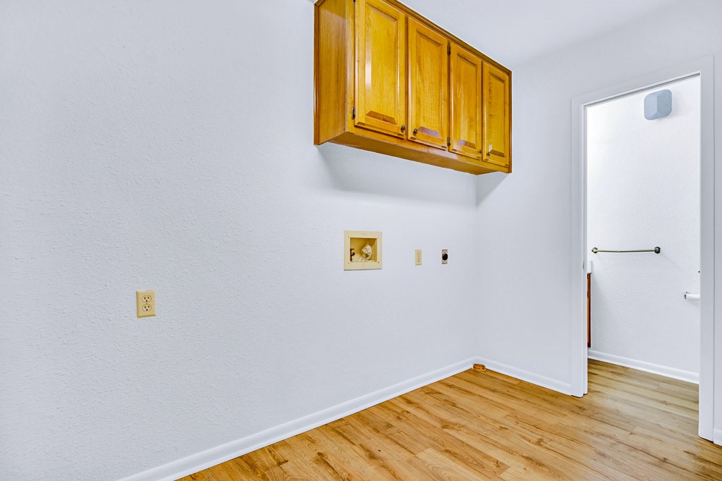 298 Jenkins Road Cedar Creek, TX 78612 - Photo 24 of 40 a view of a room with wooden floor and small space