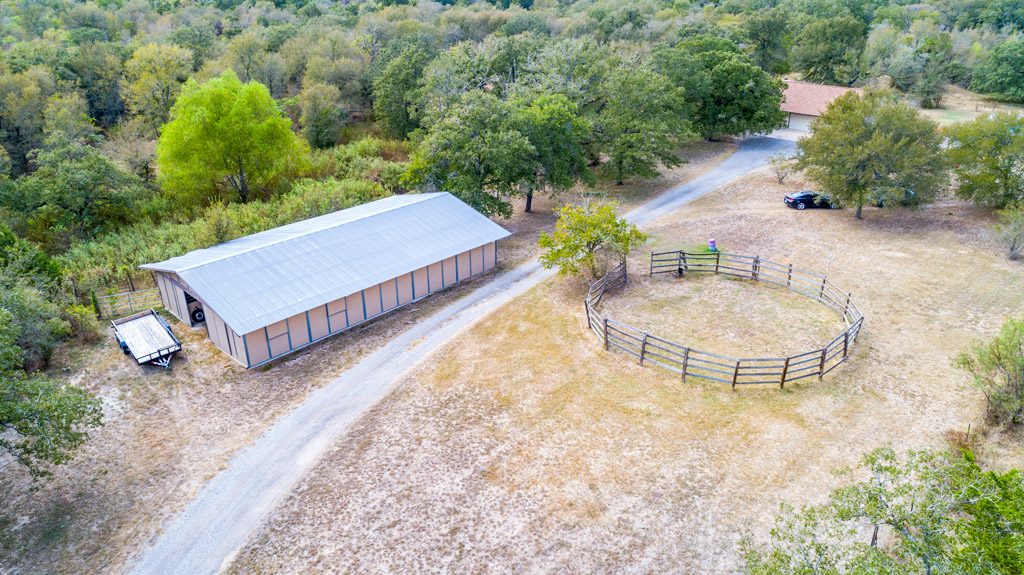 298 Jenkins Road Cedar Creek, TX 78612 - Photo 8 of 40 a view of a backyard with sitting area