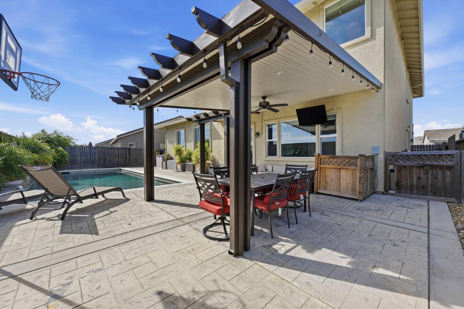 2012 Van Ruiten Drive Lodi, CA 95242 - Photo 39 of 49 a building outdoor space with patio furniture and potted plants