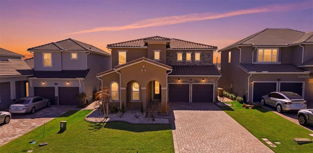 16131 Volterra Point Bella Collina, FL 34756 - Photo 2 of 52 a front view of a house with entertaining space