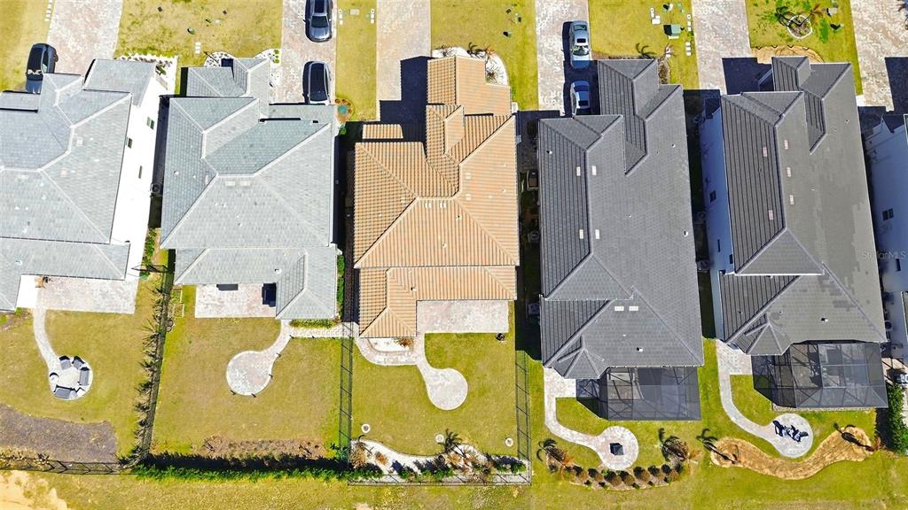 16131 Volterra Point Bella Collina, FL 34756 - Photo 48 of 52 an aerial view of residential houses with outdoor space