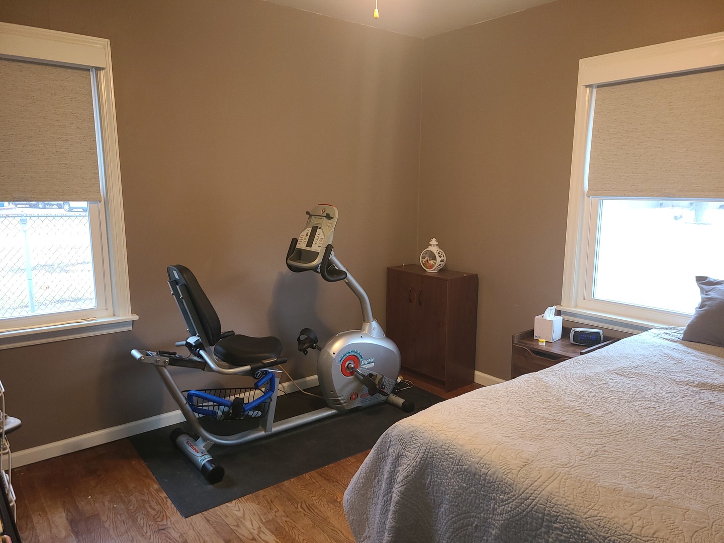 6806 Maple Court Bridgeview, IL 60455 - Photo 15 of 26 a bedroom with bed and windows