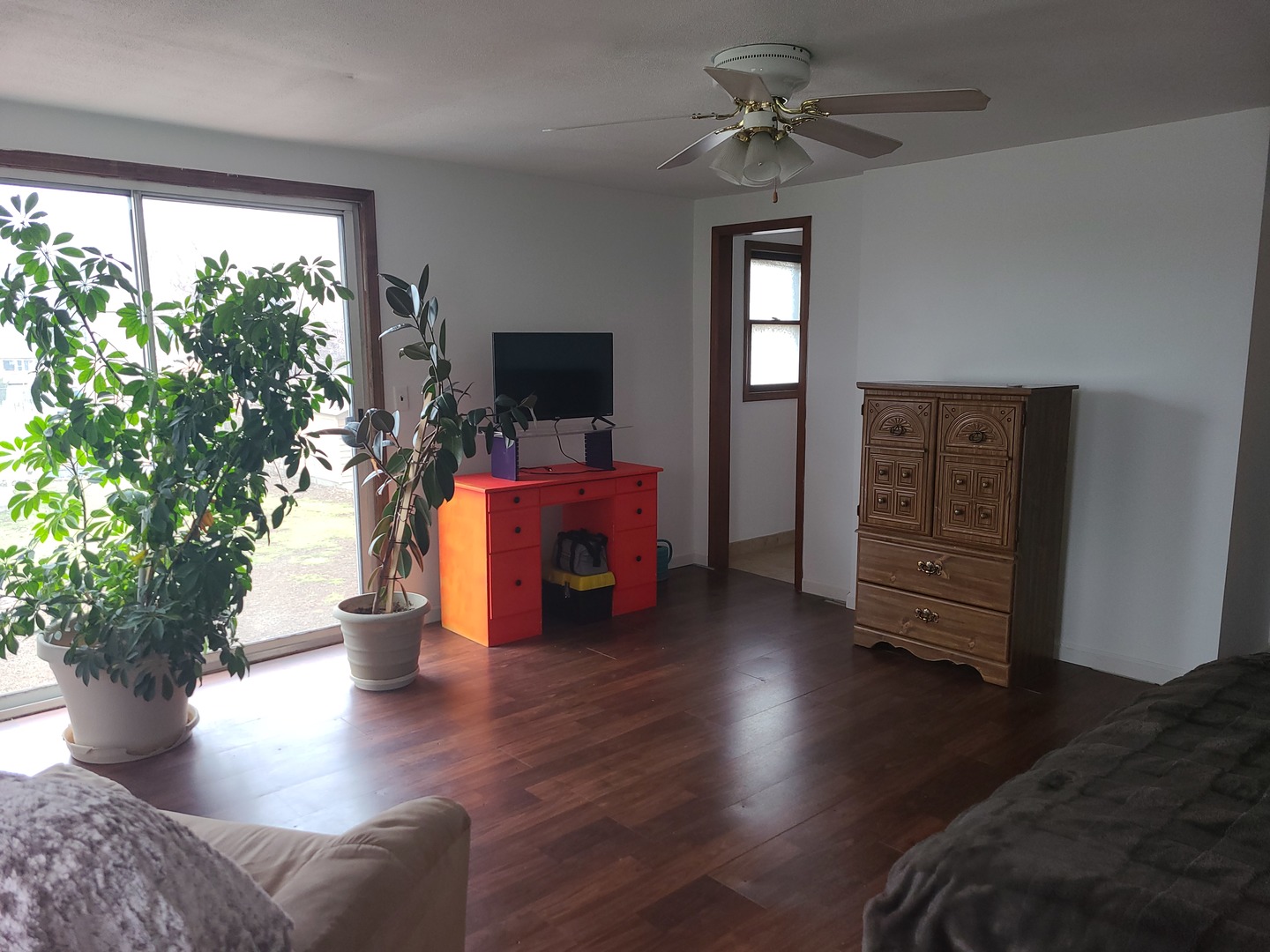 6806 Maple Court Bridgeview, IL 60455 - Photo 22 of 26 a living room with furniture and wooden floor