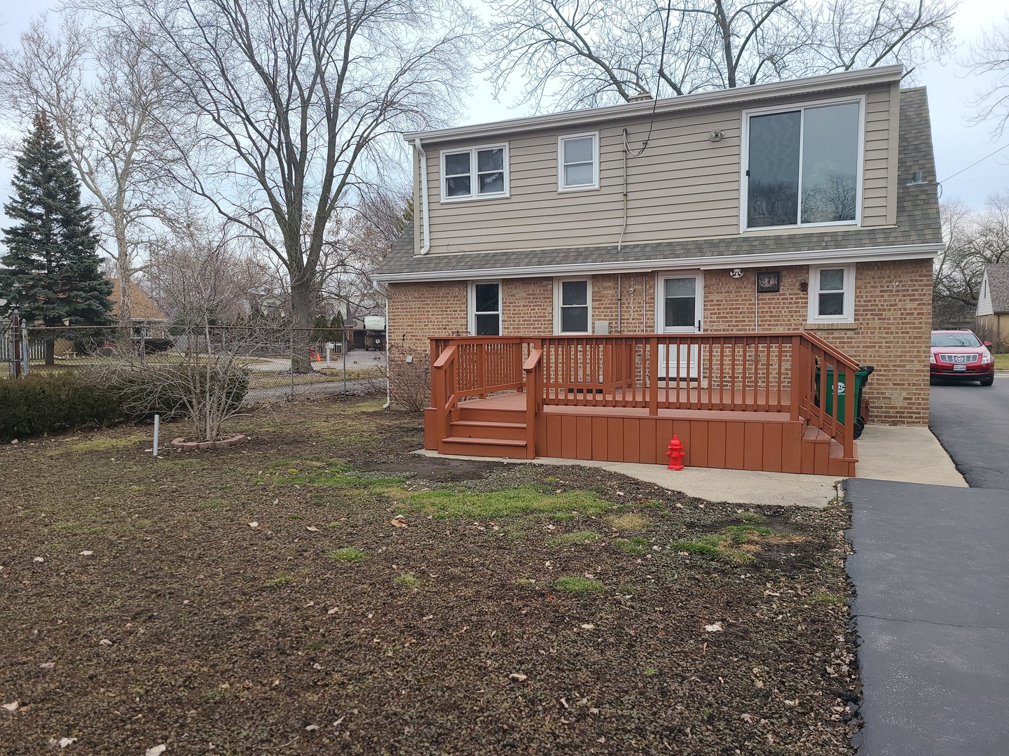 6806 Maple Court Bridgeview, IL 60455 - Photo 6 of 26 a front view of a house with garden