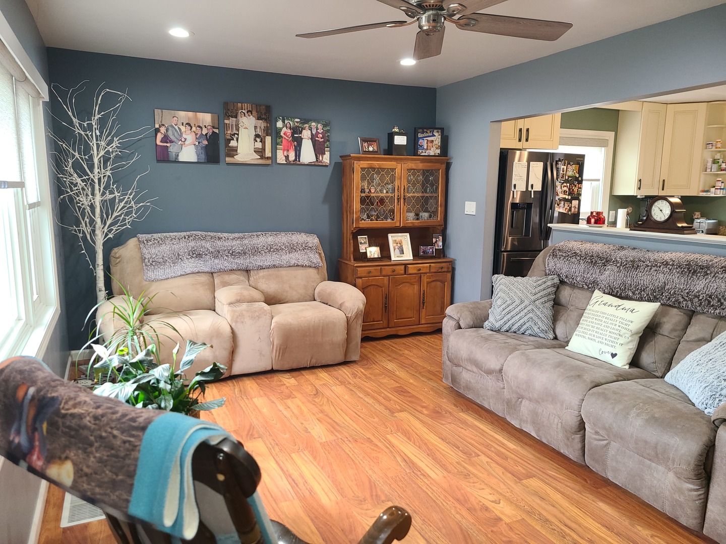 6806 Maple Court Bridgeview, IL 60455 - Photo 7 of 26 a living room with furniture and flowers