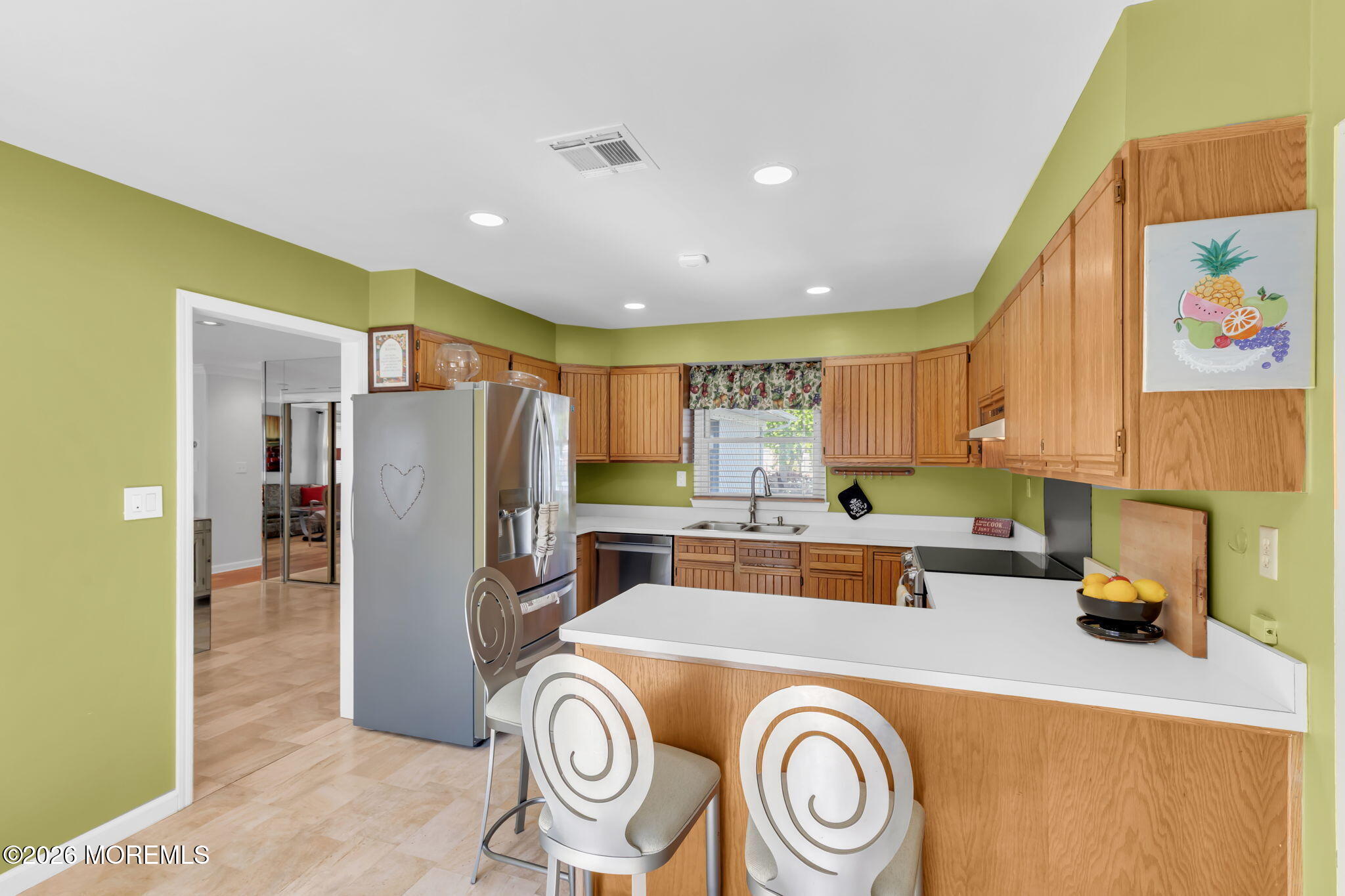 101 Andover Lane Matawan, NJ 07747 - Photo 17 of 51 a kitchen with a refrigerator and a stove top oven