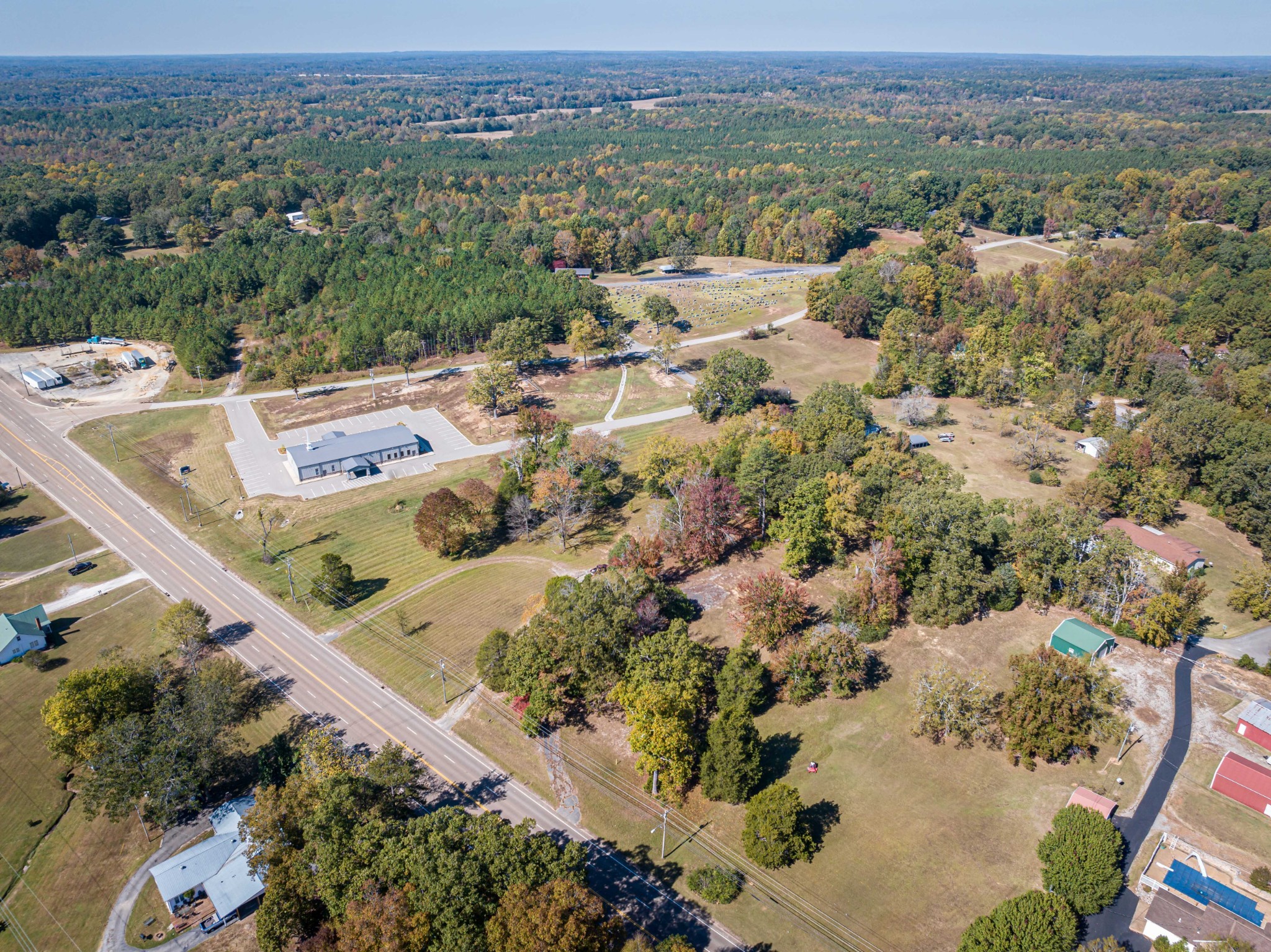 0 Main Street West Parsons, TN 38363 - Photo 5 of 16 an aerial view of residential houses with outdoor space