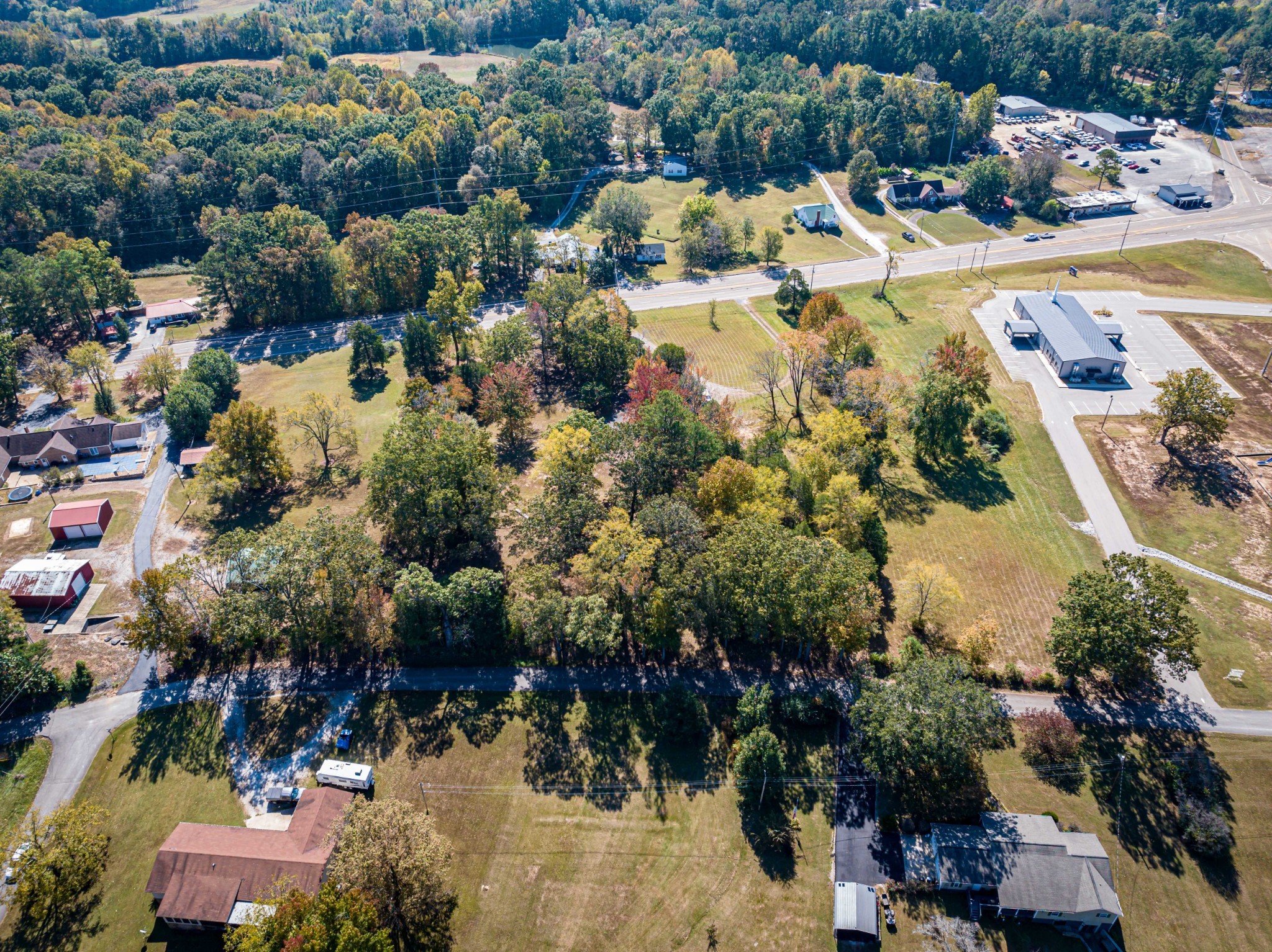 0 Main Street West Parsons, TN 38363 - Photo 6 of 16 an aerial view of residential houses with outdoor space