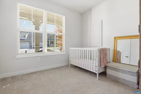 a view of a room with stairs and a window