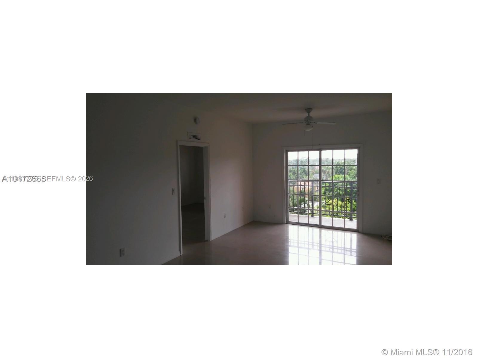 5271 Southwest 8th Street, Unit 314 Miami, FL 33134 - Photo 2 of 4 a black and white photo of a living room