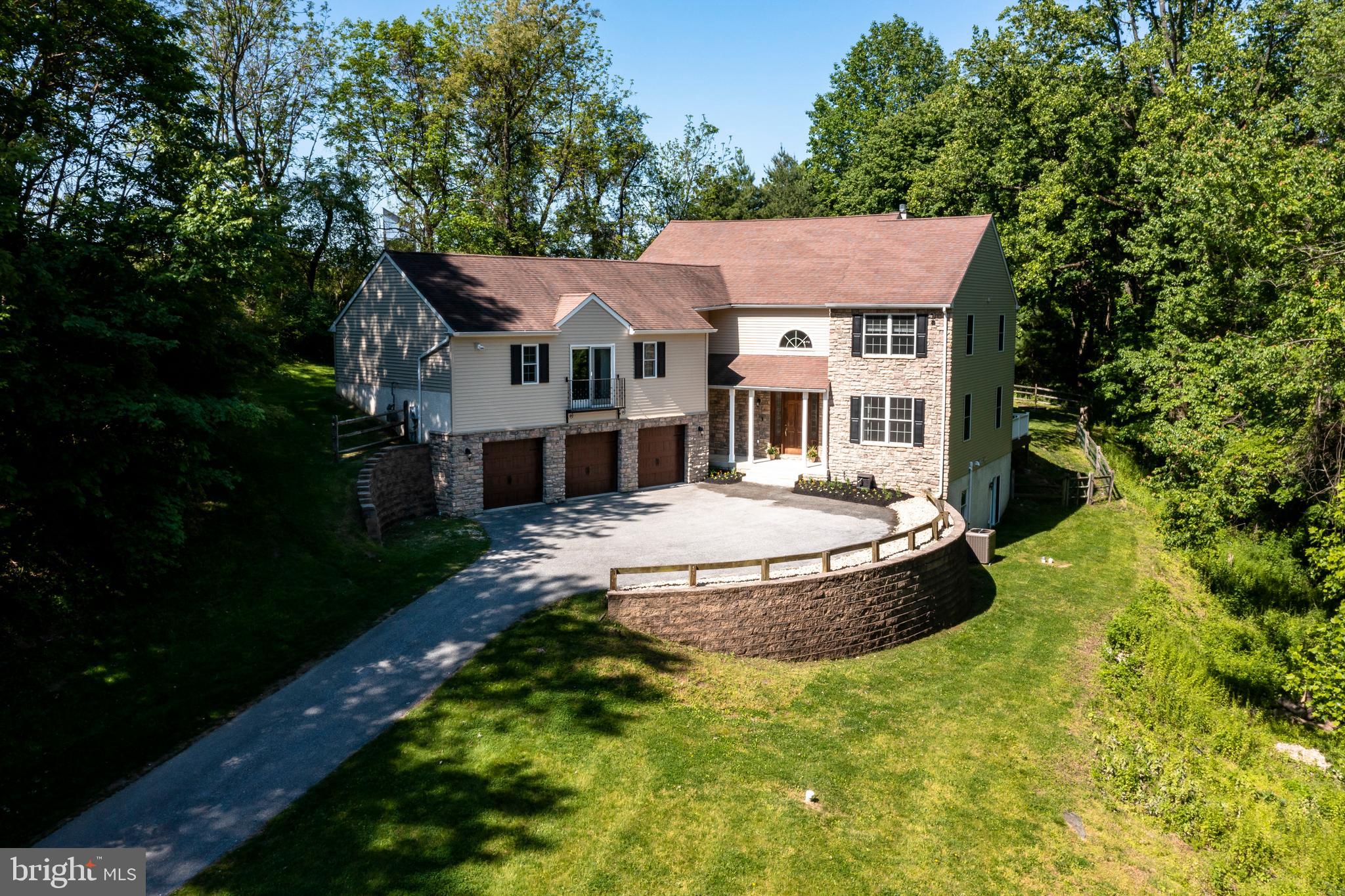 1334 Burke Road West Chester, PA 19380 - Photo 6 of 55 Exterior Front w/retaining wall