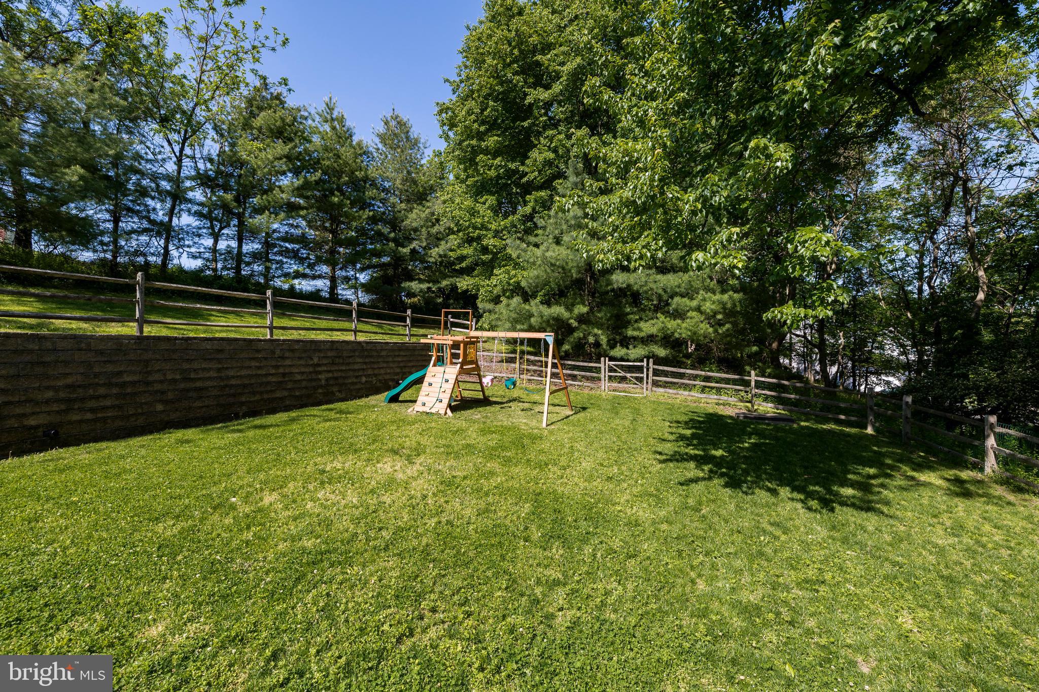1334 Burke Road West Chester, PA 19380 - Photo 51 of 55 Back yard w/ retaining wall
