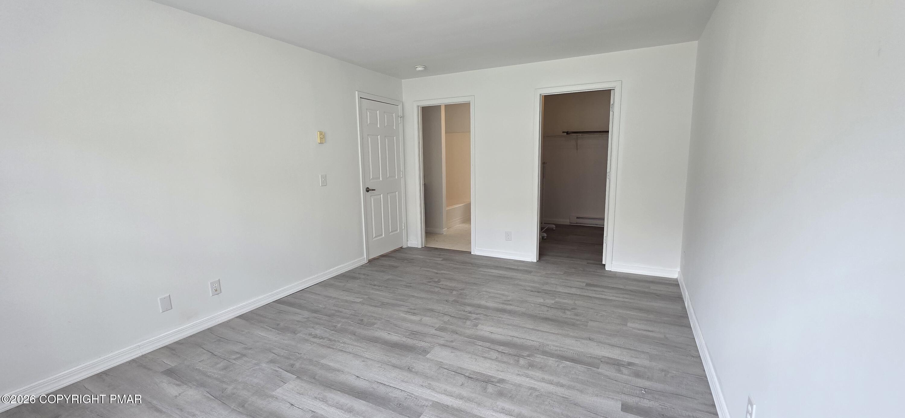 4715 Norwood Lane Tobyhanna, PA 18466 - Photo 11 of 14 a view of an empty room with wooden floor