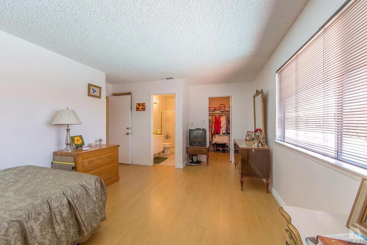 6128 Al Way Simi Valley, CA 93063 - Photo 17 of 27 a bed room with a bed and a window