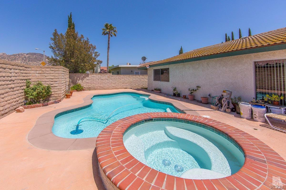 6128 Al Way Simi Valley, CA 93063 - Photo 19 of 27 a swimming pool with outdoor seating
