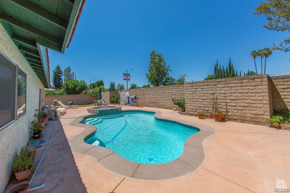 6128 Al Way Simi Valley, CA 93063 - Photo 20 of 27 a view of a swimming pool with a patio