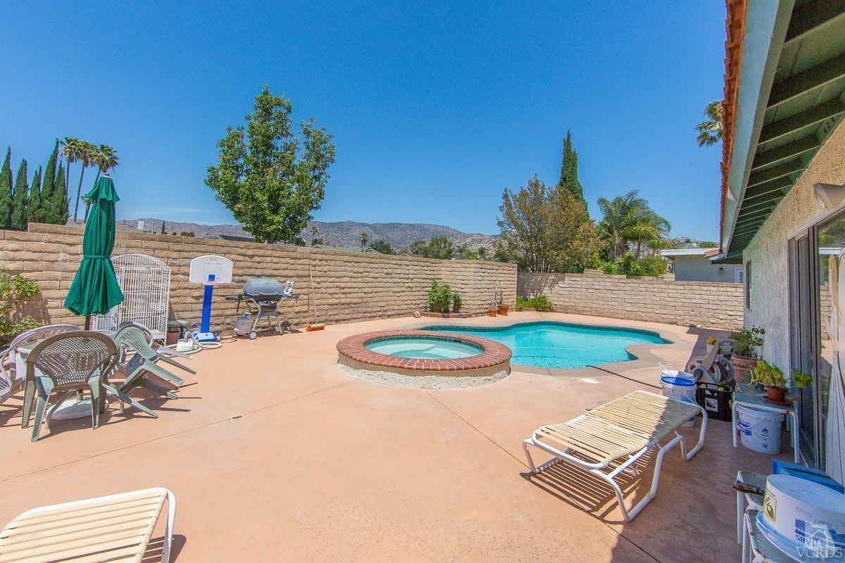 6128 Al Way Simi Valley, CA 93063 - Photo 21 of 27 a view of a swimming pool with outdoor seating and plants
