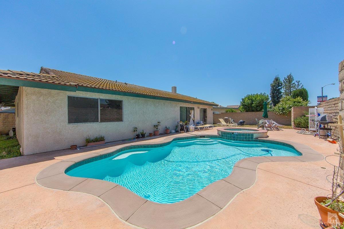 6128 Al Way Simi Valley, CA 93063 - Photo 23 of 27 a front view of house with yard and green space