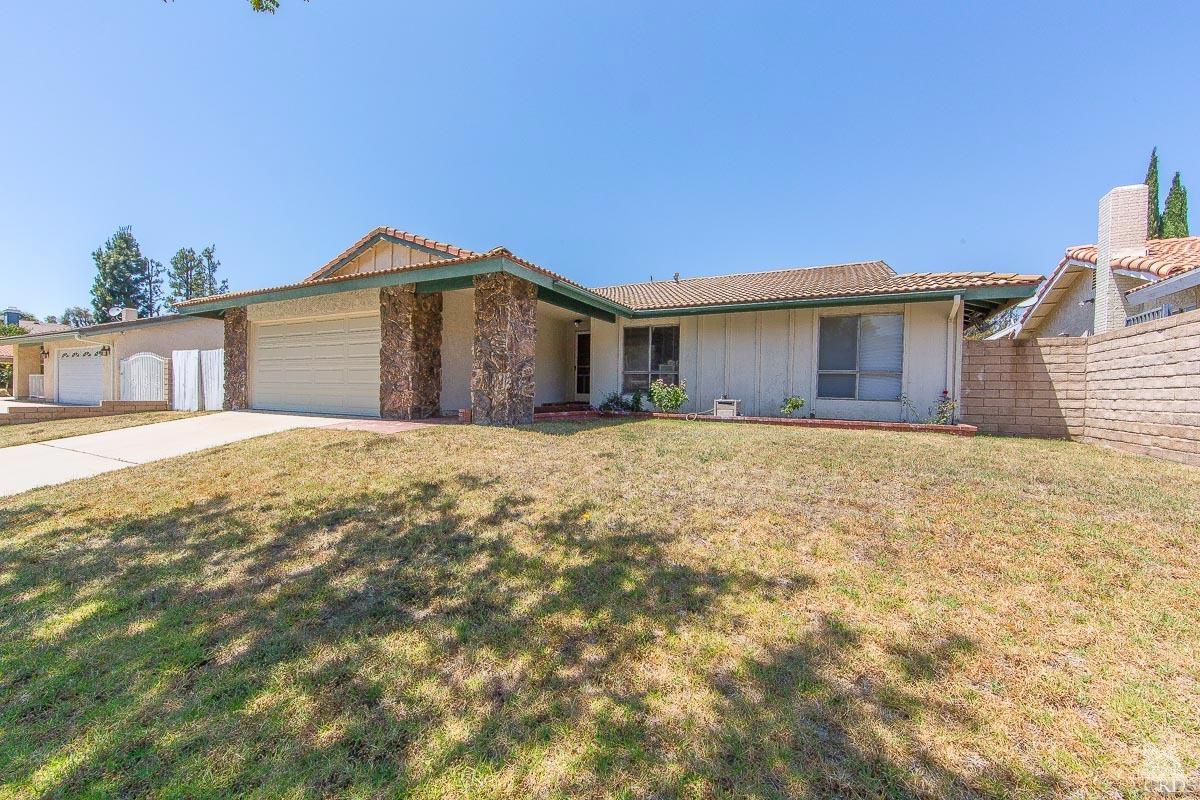 6128 Al Way Simi Valley, CA 93063 - Photo 27 of 27 a front view of a house with a yard