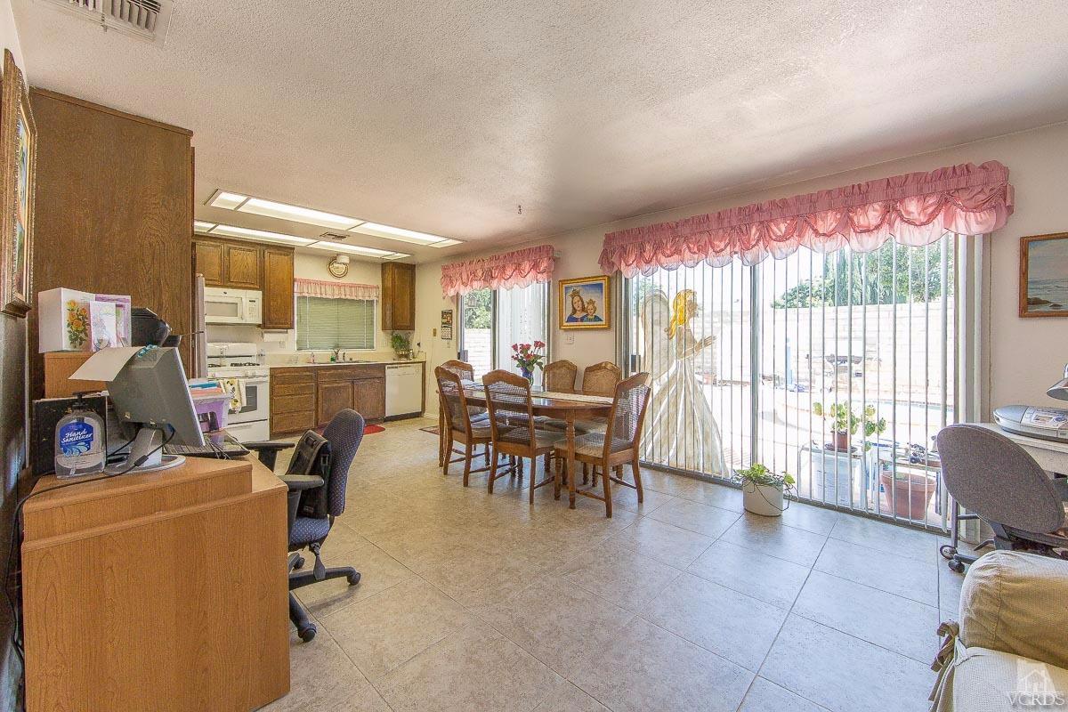 6128 Al Way Simi Valley, CA 93063 - Photo 5 of 27 a view of a livingroom with furniture and a window