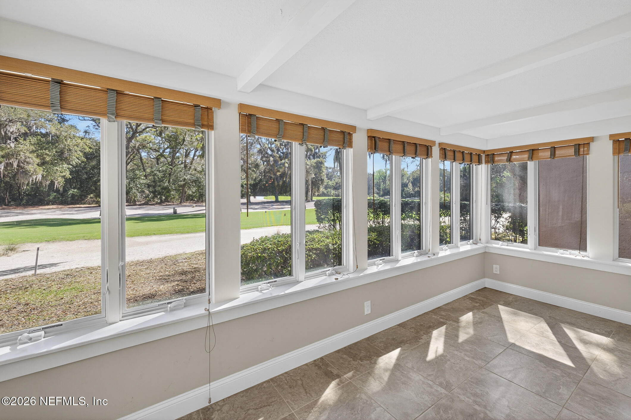 3301 Sea Marsh Road Fernandina Beach, FL 32034 - Photo 8 of 41 a view of an empty room with a large window