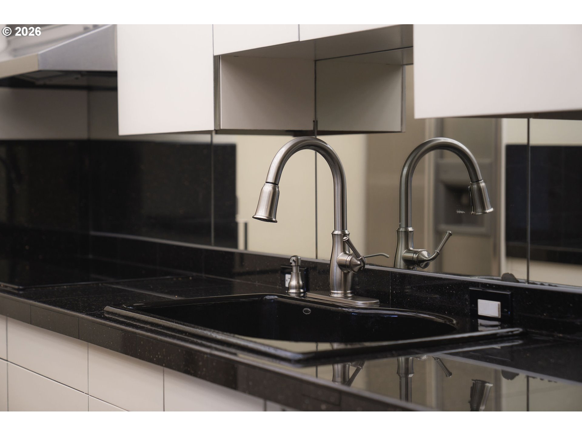 2309 Southwest 1st Avenue, Unit 741 Portland, OR 97201 - Photo 17 of 36 a bathroom with a sink and a mirror