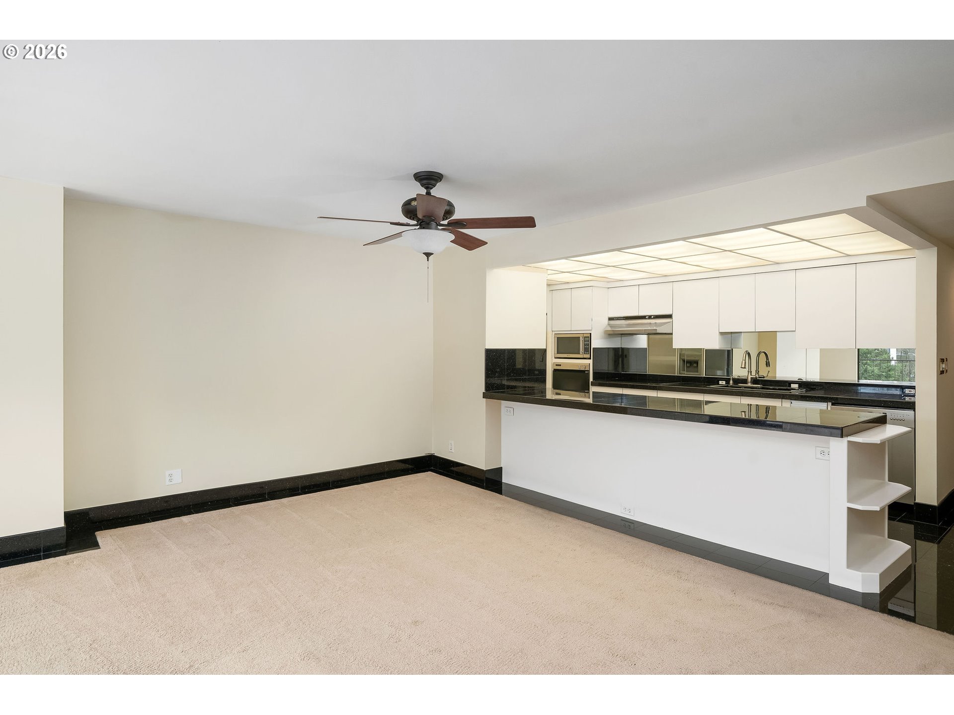 2309 Southwest 1st Avenue, Unit 741 Portland, OR 97201 - Photo 19 of 36 a view of a room with a kitchen