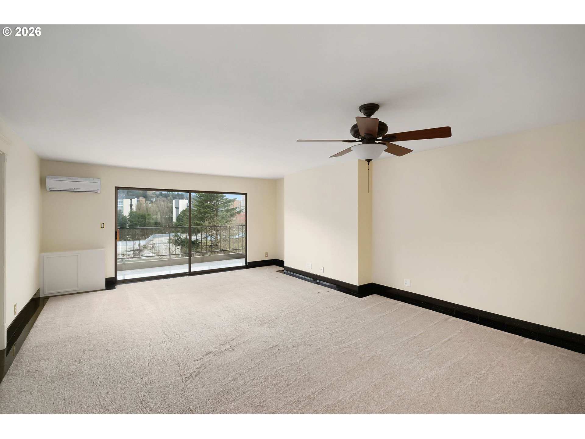 2309 Southwest 1st Avenue, Unit 741 Portland, OR 97201 - Photo 21 of 36 a view of an empty room with a window
