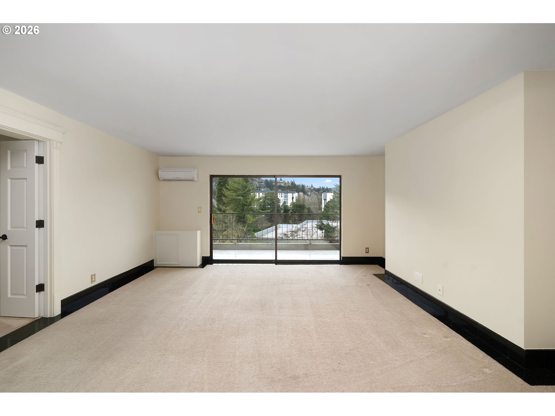 2309 Southwest 1st Avenue, Unit 741 Portland, OR 97201 - Photo 22 of 36 a view of an empty room with a window