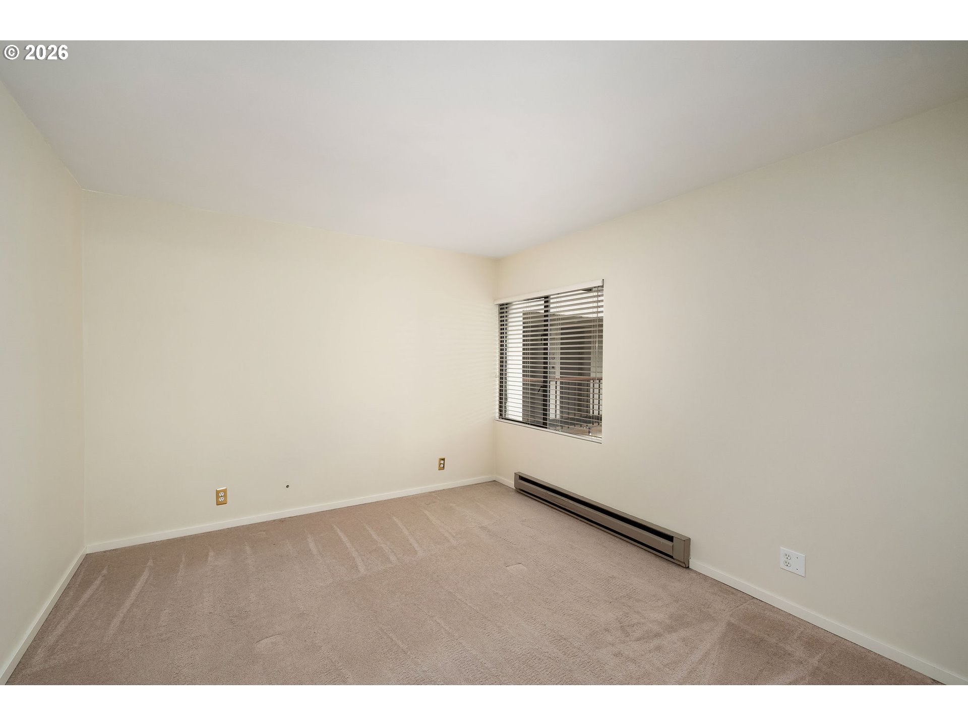 2309 Southwest 1st Avenue, Unit 741 Portland, OR 97201 - Photo 30 of 36 a view of an empty room and window