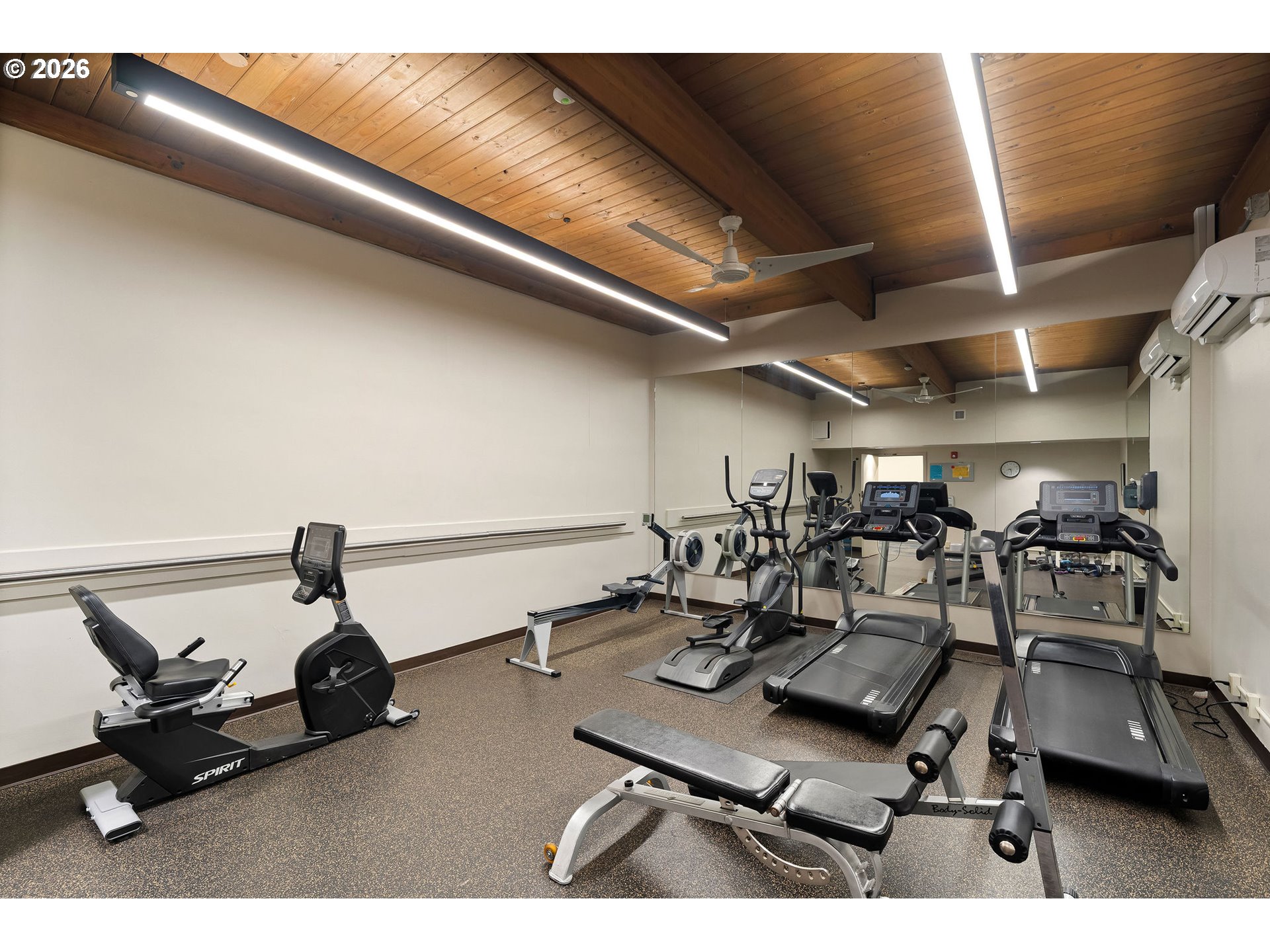 2309 Southwest 1st Avenue, Unit 741 Portland, OR 97201 - Photo 33 of 36 a room with gym equipment and a large window