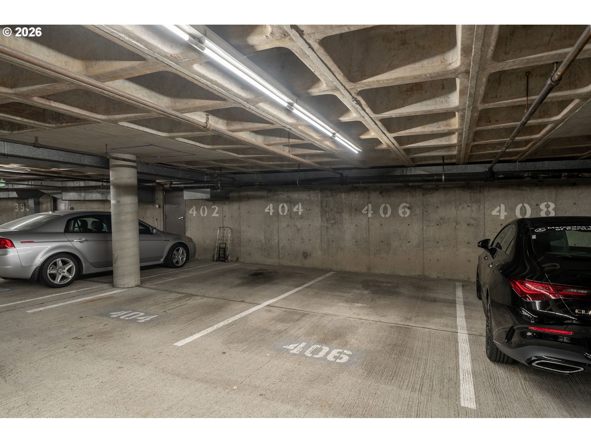 2309 Southwest 1st Avenue, Unit 741 Portland, OR 97201 - Photo 34 of 36 a view of parking garage with cars parked