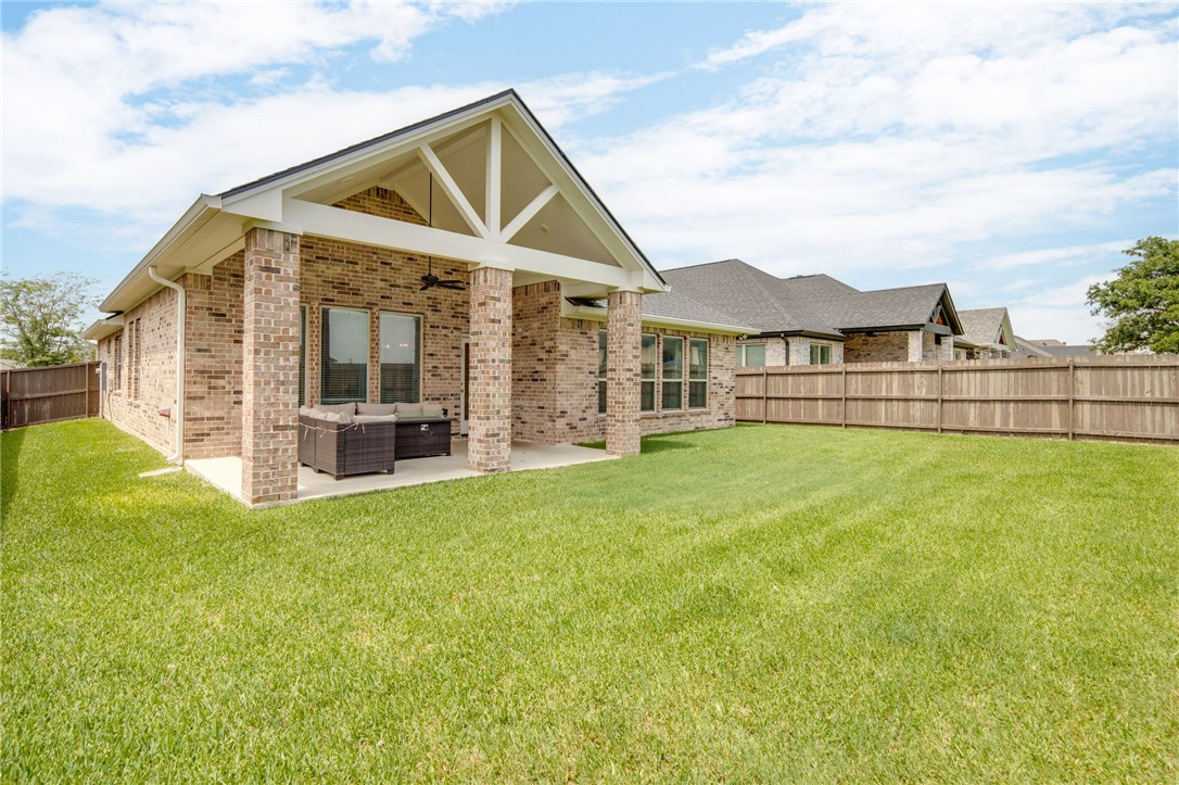 4302 Appalachian Trail Bryan, TX 77802 - Photo 22 of 25 a view of a house with a garden and deck