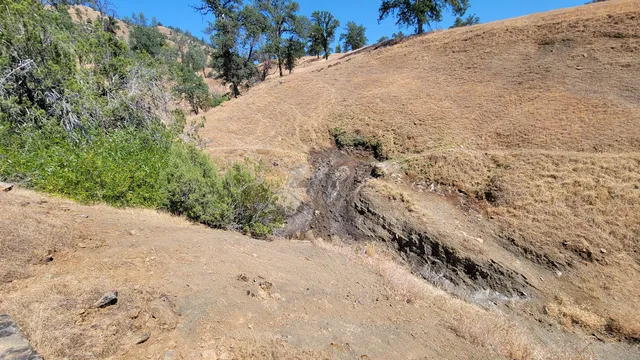 a view of snow on the road