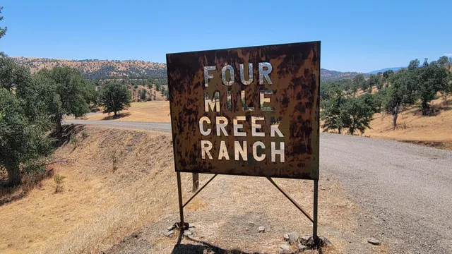 a view of mountain view with mountains in the background