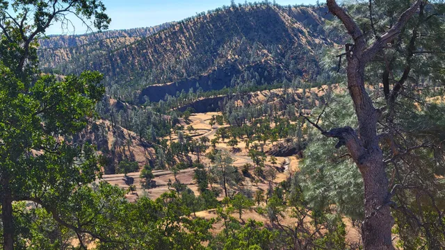 a view of mountain view with mountains in the background