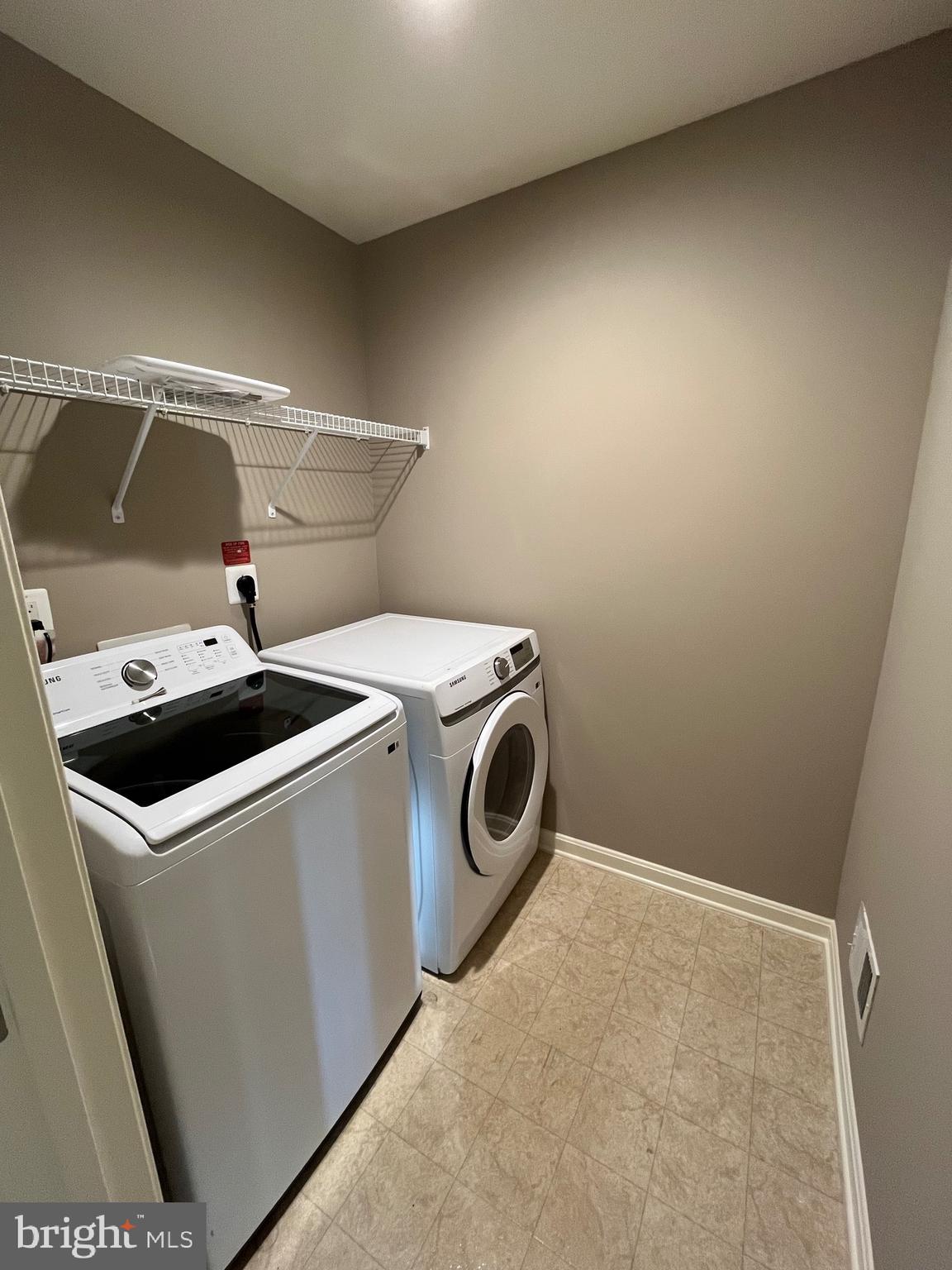 42253 Dean Chapel Square Chantilly, VA 20152 - Photo 12 of 24 a utility room with dryer and washer