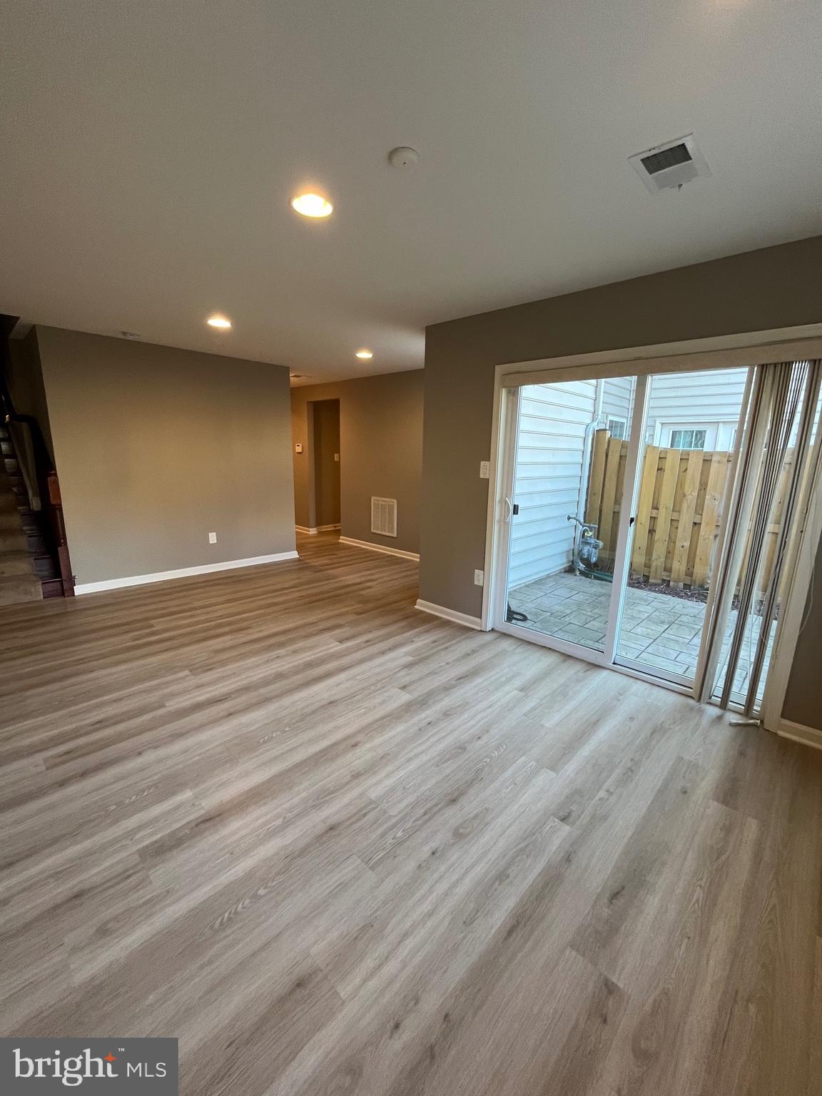 42253 Dean Chapel Square Chantilly, VA 20152 - Photo 17 of 24 wooden floor in an empty room with a window