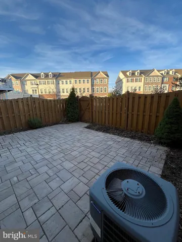 a view of balcony with furniture