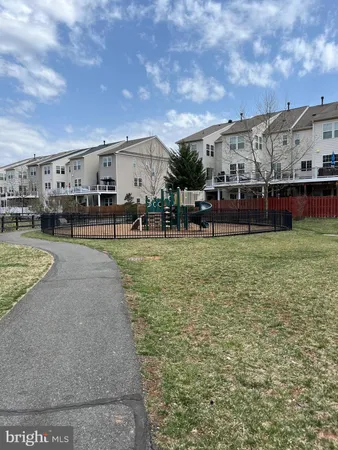 a view of a big yard next to a building