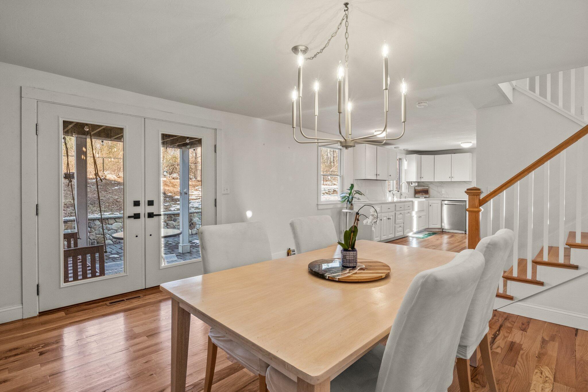 9 Deacons Path Sandwich, MA 02563 - Photo 17 of 41 a view of a dining room with furniture and wooden floor