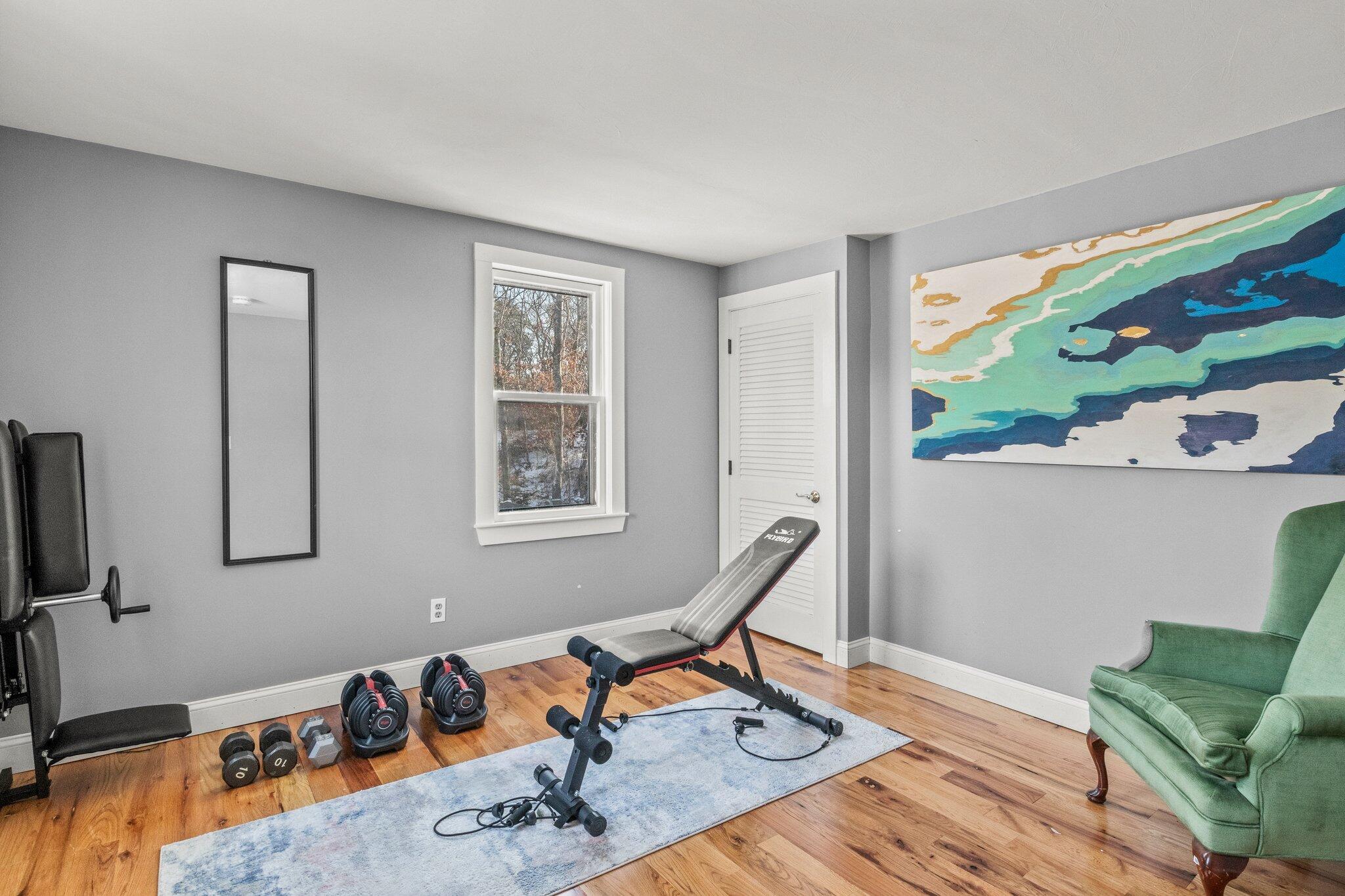 9 Deacons Path Sandwich, MA 02563 - Photo 31 of 41 a living room with furniture and a flat screen tv