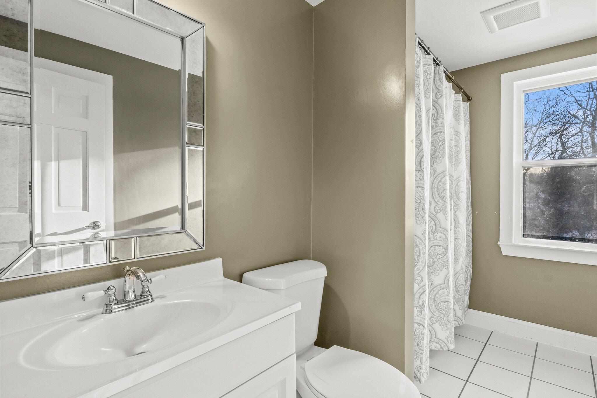 9 Deacons Path Sandwich, MA 02563 - Photo 34 of 41 a bathroom with a sink toilet and shower