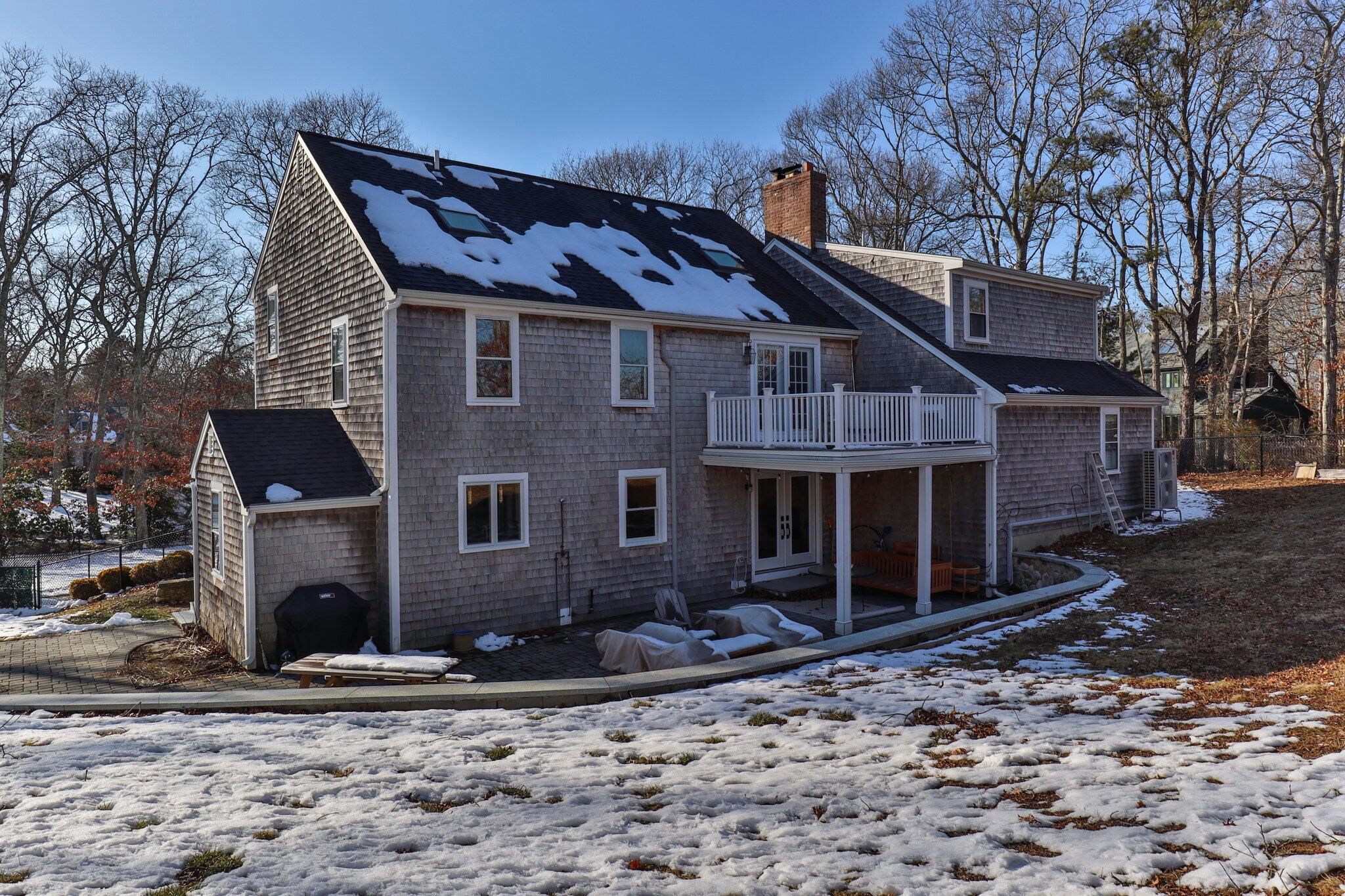 9 Deacons Path Sandwich, MA 02563 - Photo 39 of 41 a front view of a house with a yard