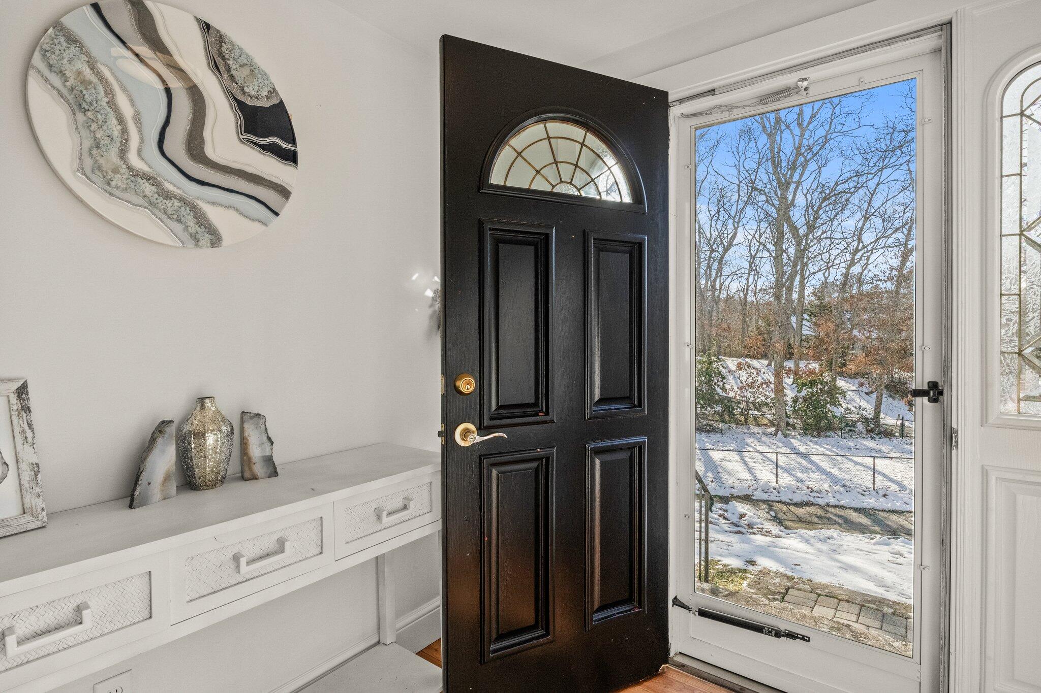 9 Deacons Path Sandwich, MA 02563 - Photo 4 of 41 a view of a entryway door of the house
