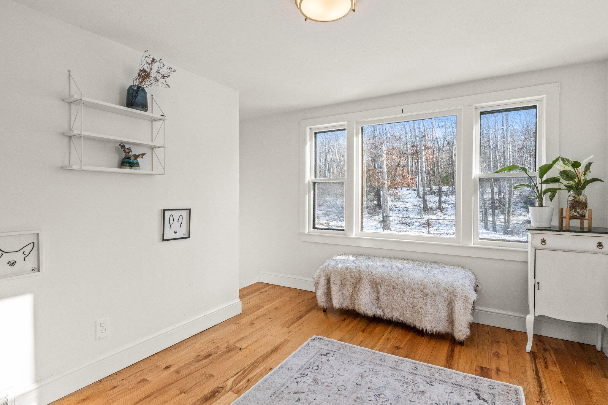 9 Deacons Path Sandwich, MA 02563 - Photo 8 of 41 a bedroom with a bed and window
