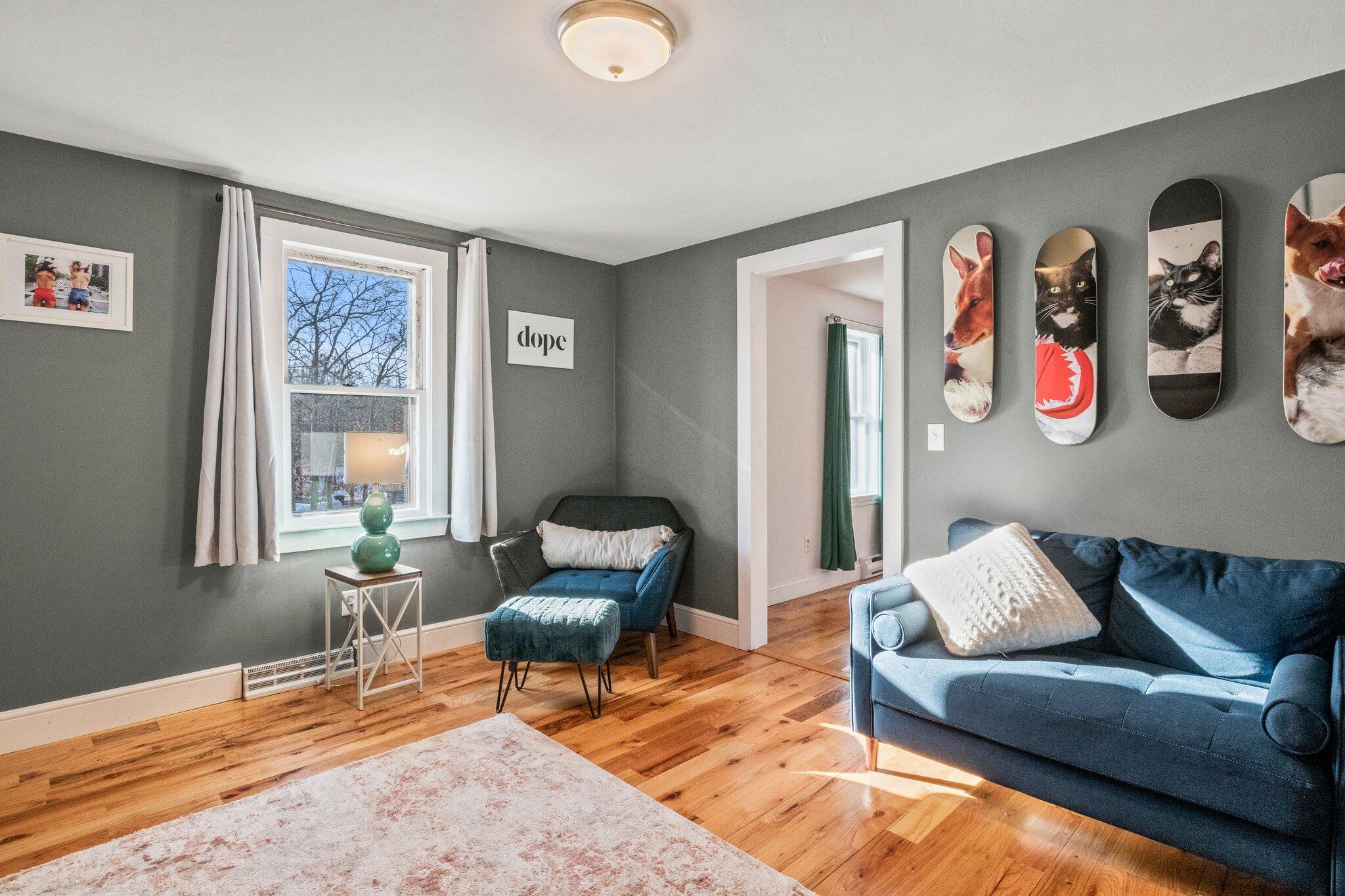 9 Deacons Path Sandwich, MA 02563 - Photo 9 of 41 a living room with furniture and window