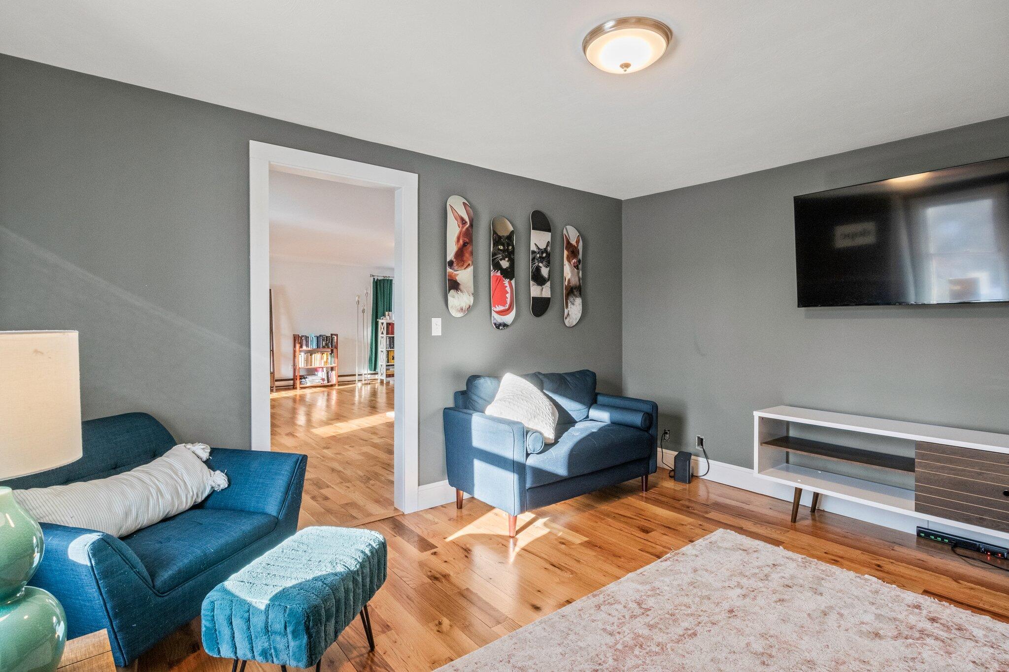 9 Deacons Path Sandwich, MA 02563 - Photo 10 of 41 a living room with furniture and a flat screen tv
