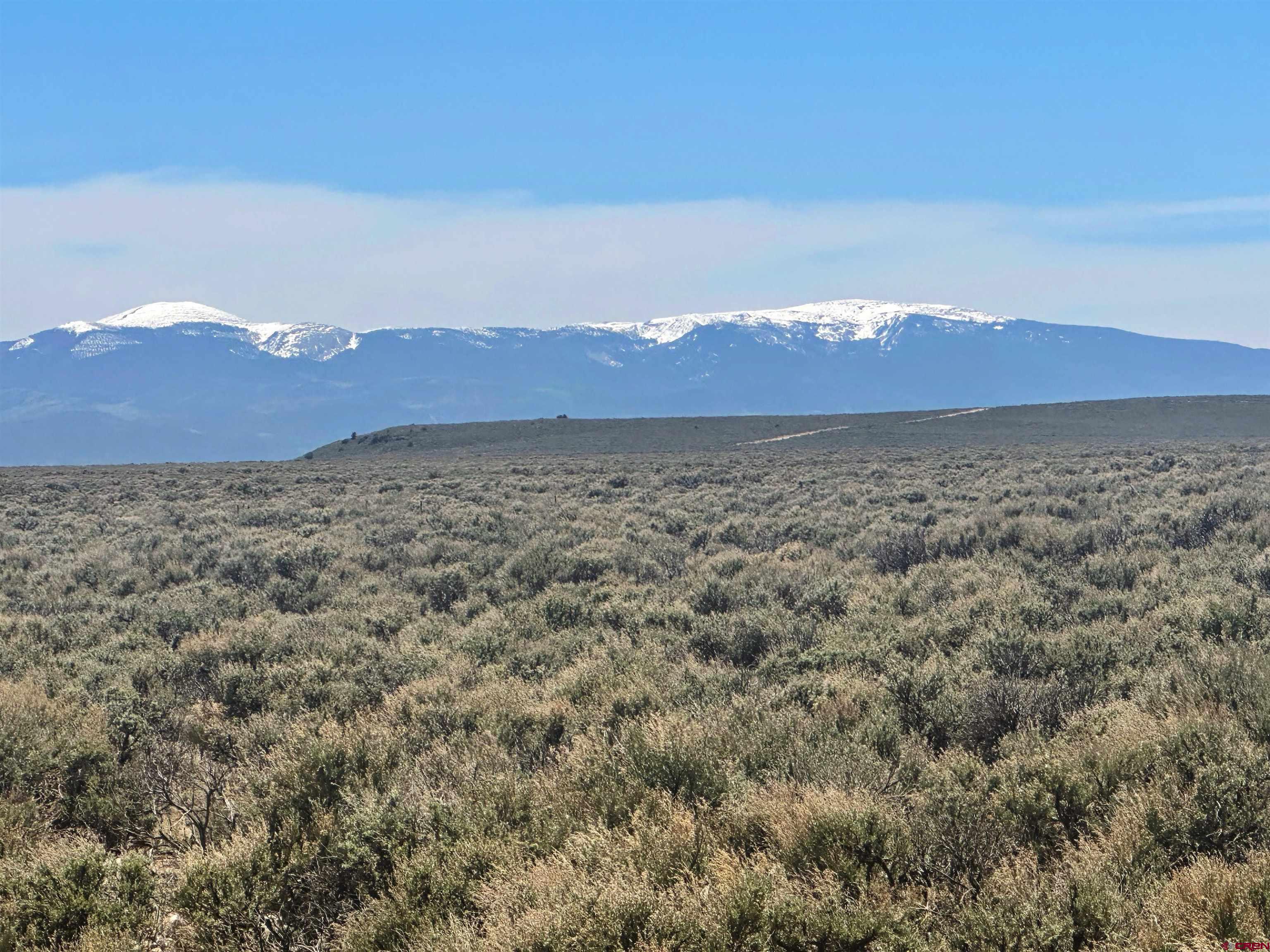 -tbd County Road North Fort Garland, CO 81133 - Photo 3 of 5 a view of an ocean beach and mountain